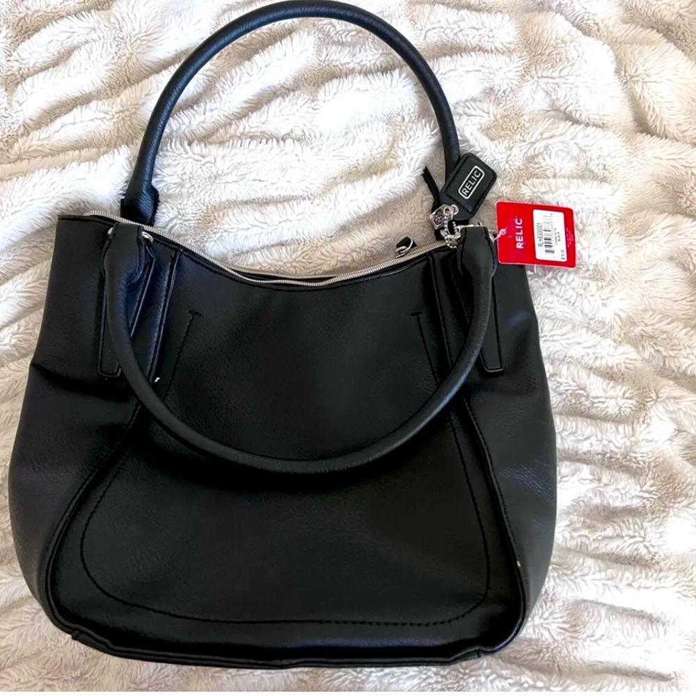 New with tags -  Black leather Relic purse - tag price $78